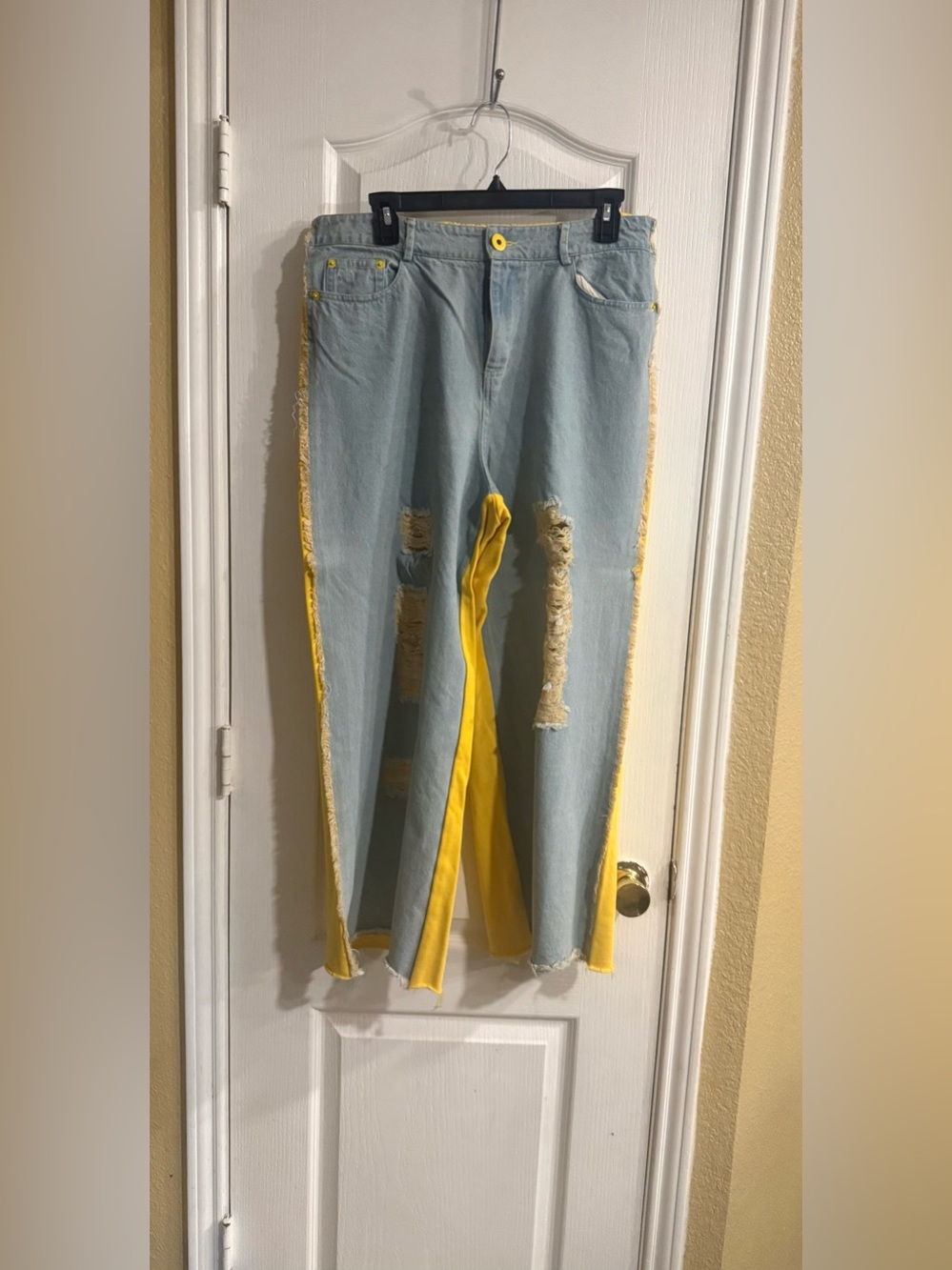 Light Blue Distressed Jeans with Bright Yellow Back Side